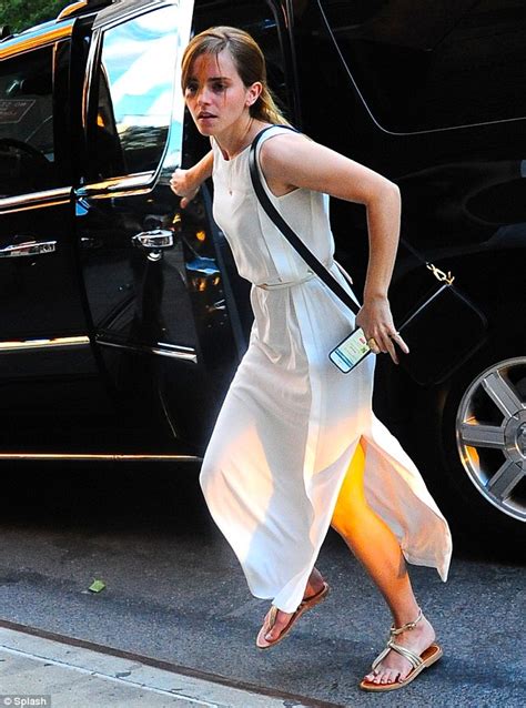 Emma Watson Shows Off Her Chic Summer Style In An Elegant White Belted