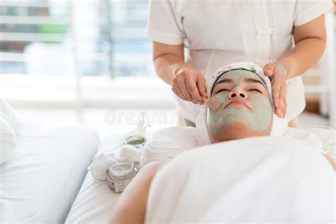 A Female Therapist Doing Facial Spatreatment Add Moisture To Th Stock Image Image Of Body
