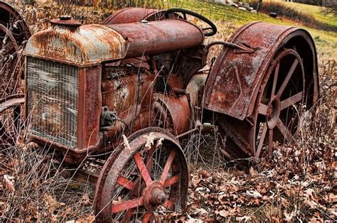 Rusty And Better Days Gone By But Still On The Farm Old Tractor