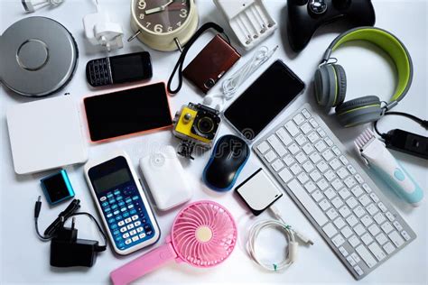 Many Used Modern Electronic Gadgets For Daily Use On White Floor Reuse