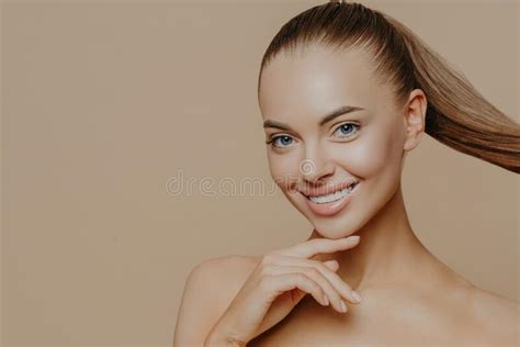Tranquil Undressed Woman With Healthy Perfect Skin Dark Hair Combed In