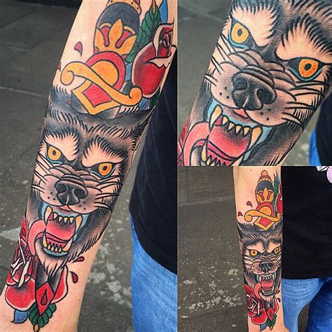 Traditional Wolf Dagger Tattoo By Sammysurjaytattoo