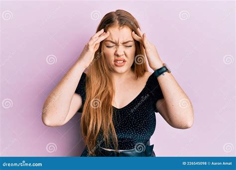 Young Beautiful Redhead Woman Wearing Elegant And Look With Hand On Head Headache Because