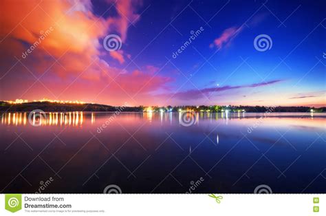Night Landscape On The Lake With Blue Sky And Clouds Stock Image