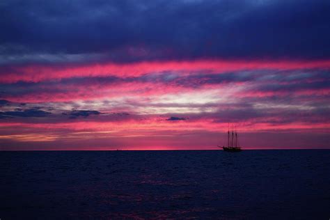 A Sailboat Sunset Photograph By James Defazio Fine Art America