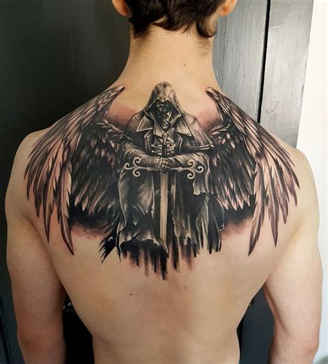 Тату на спине 80 фото эскизы татуировок на спине для мужчин и девушек
