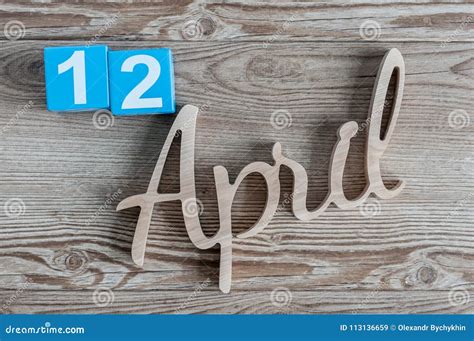 April 12th Day 12 Of April Month Color Calendar On Wooden Background