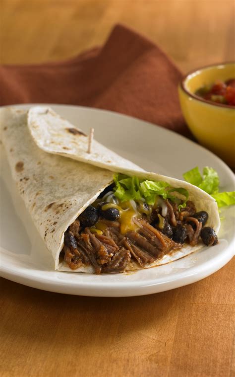 These hearty beef, bean, and cheese burritos are very filling, and they are great for lunch boxes, right out of the freezer. Southwest Beef and Bean Burritos | Recipe | Mexican food ...
