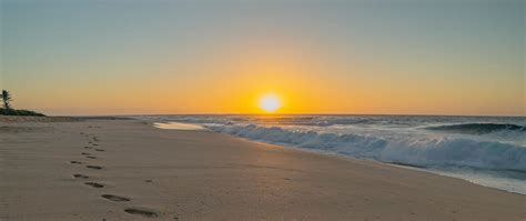 Download Wallpaper 2560x1080 Beach Sunset Footprints Sand Dual Wide