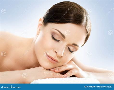 Portrait Of A Young Woman Relaxing On A Massage Stock Photo Image Of