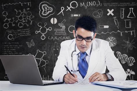 Male Doctor Working With Laptop Stock Photo Image Of Hospital Clinic
