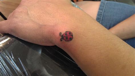 Small 3d lady bug tattoo design: 29 Impressive Ladybug Wrist Tattoos