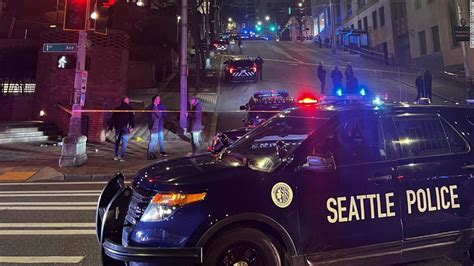 seattle police shoot kill man after he crashes into federal building cnn