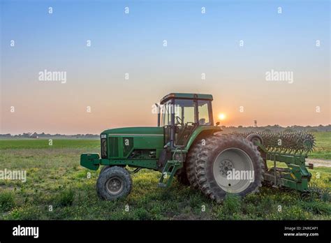 Agricultural Landscape Of A Tractor In A Field On A Maryland Farm With