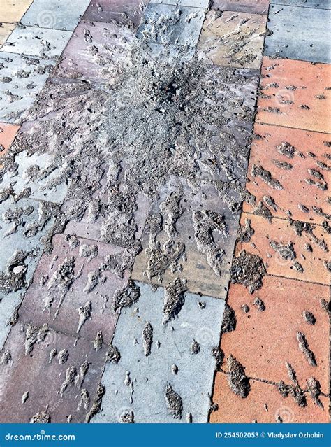 Traces On The Pavement Tile From The Explosion Of A Mortar Shell Stock