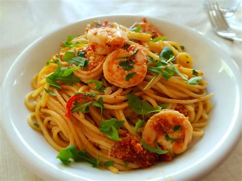 pasta con gamberetti e rucola really loving the dried tomato flavor in this sauce dining and