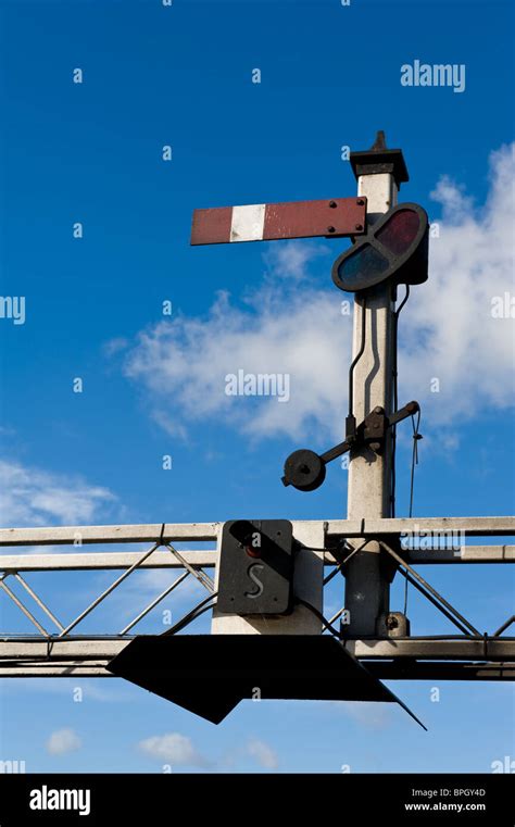 A Traditional Old Semaphore Railway Signal Indicating Trains To Stop