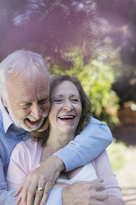 Affectionate Smiling Senior Couple Hugging Stock Image F022 7475 Science Photo Library