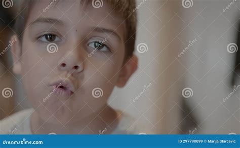 Adorable Prescholl Kid Making Funny Face Expressions Stock Image