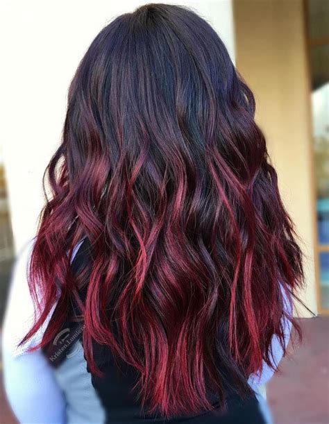 In this haircut, a copper browning highlight has been applied on the long hair in the entire head, and then the hair strands have been curled downwards so they can hang freely. 45 Shades of Burgundy Hair: Dark Burgundy, Maroon ...