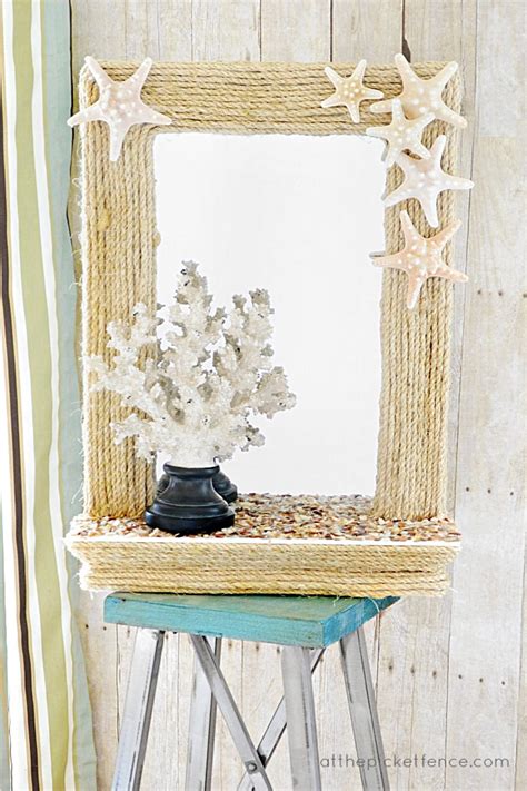 Adore this gold mirror with dark green vanity in this pretty modern bathroom remodel! 10 Summer Seashell Decor Ideas