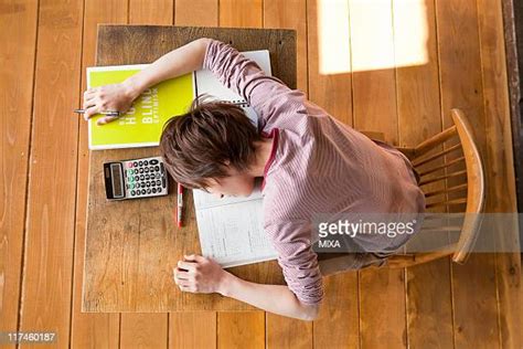 Falling Asleep Desk Photos And Premium High Res Pictures Getty Images