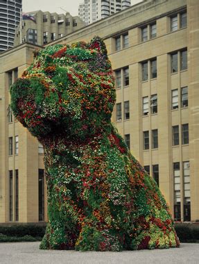 The miniature replica puppy comprised of dried flowers sitting atop of a plastic base foundation (printed on base. Jeff Koons Artwork