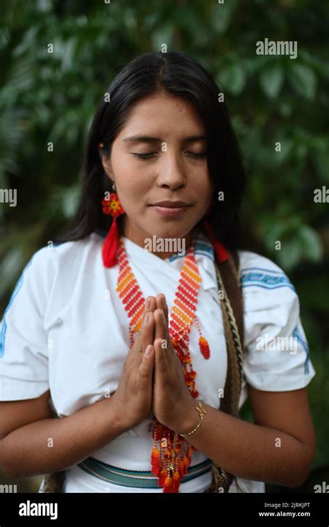 Close Up Portrait Of Young Arhuaco Indigenous Woman With Eyes Closed In