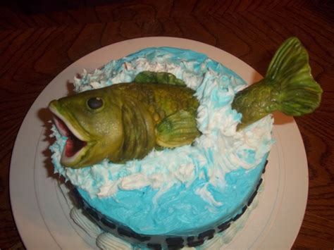 But, if you feel like you won't have enough, you can make some cupcakes. Splashing Fish Birthday Cake - CakeCentral.com