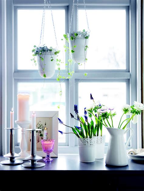 More light means better growth and blooms. Matching pots and hanging planters by the windows to ...