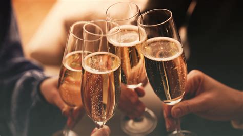 The Historical Reason We Pop Champagne Bottles On New Years Eve