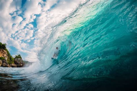 April 17 2019 Bali Indonesia Surfer Ride On Surfboard At Wave