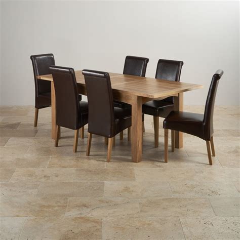 Set a generous table with our gorgeous dining room furniture, whether you're entertaining family and friends or enjoying a quiet meal at home. Cairo Extending Dining Set in Oak: Table + 6 Leather Chairs