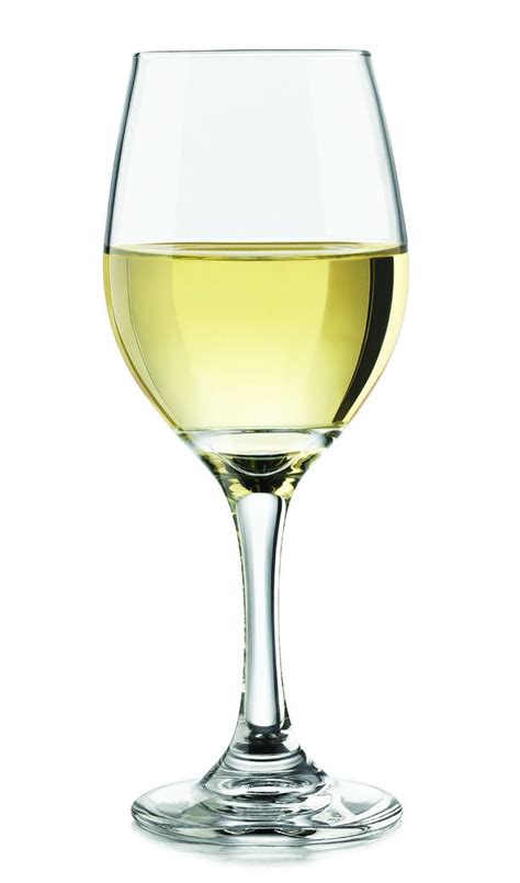 A Wine Glass Filled With White Wine