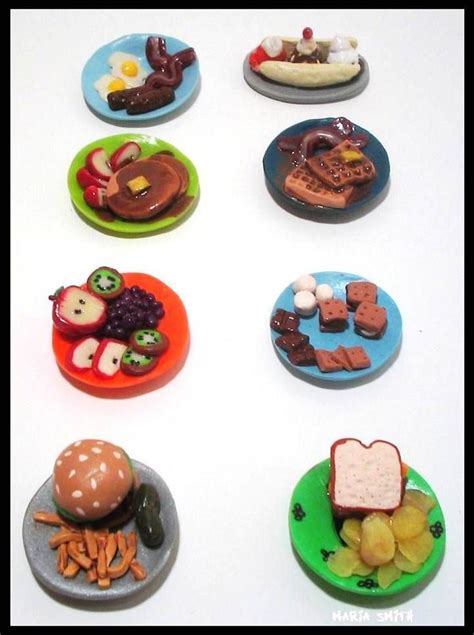 There Are Many Small Plates That Have Food On Them In The Shape Of