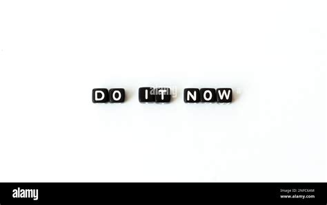 Do It Now Motivation Quote In Black Letter Beads On White Background
