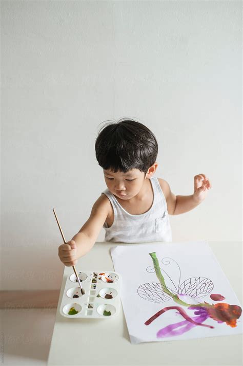 Young Toddler Learning To Paint By Stocksy Contributor Alita