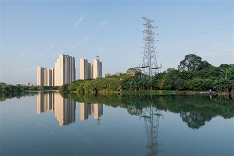 Premium Photo A City Surrounded By Forests And Rivers