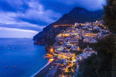 Cliff Side Buildings Illuminated At Night Positano Amalfi Coast