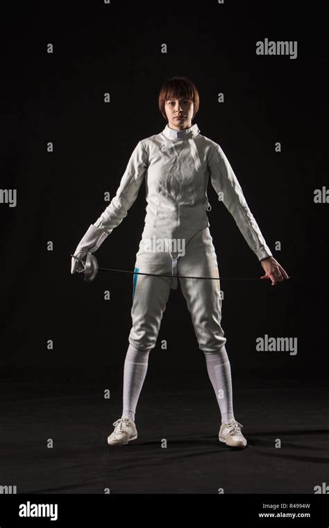 The Portrait Of Woman Wearing White Fencing Costume On Black Stock Photo Alamy