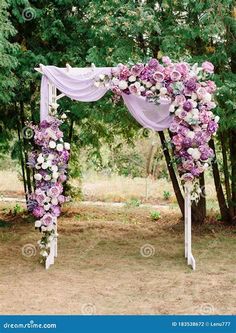 Purple Wedding Arch With White Roses And Violet Fabric Summer Wedding