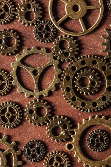 Steampunk Mechanical Cogs Gears Wheels On Wooden Background Photo By