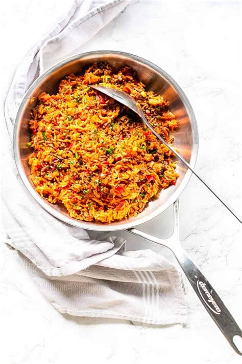 Stir in the onion, green bell pepper, tomatoes, water, rice, chile sauce, salt, brown sugar, cumin, worcestershire sauce and ground black pepper. Spanish Rice Recipe With Ground Beef - The Tortilla Channel