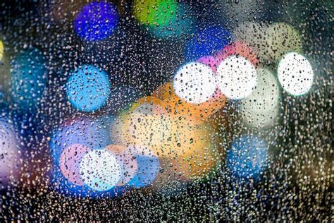 Premium Photo Street Bokeh Lights With Raindrops On Window Glass