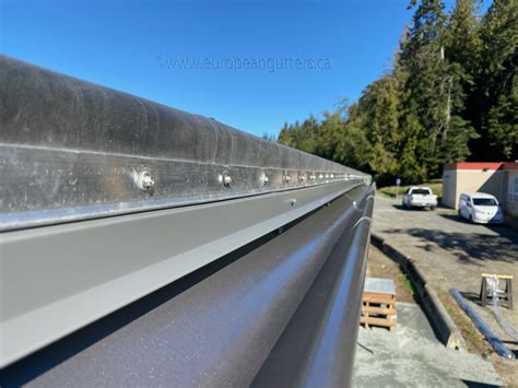 Precision Gutters Ltd. hanging Anthracite Lindab Rainline Gutters on ...