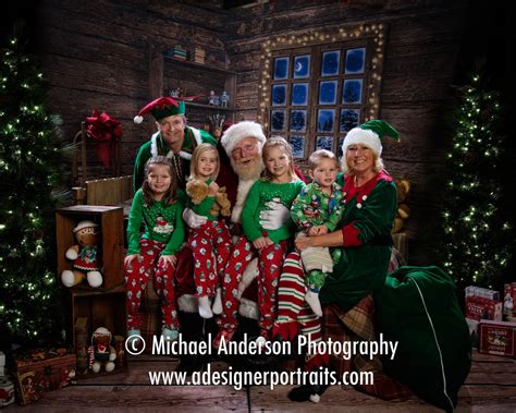 Two Of Santas Elves Pose With Four Cousins And Their Santa Claus