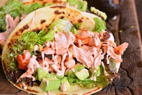 Grilled fish tacos and taco sauce. Spicy Salmon Tacos - Will Cook For Smiles