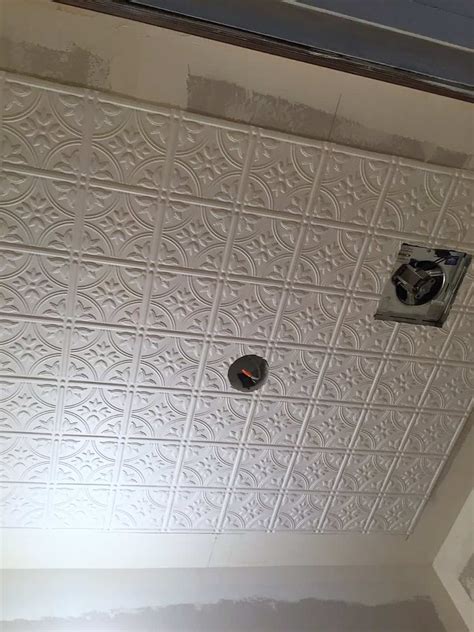 Original tin ceiling tiles cost at least six times more than that and cannot be easily cut to fit like these can. 7 Easy Steps for Installing Faux Tin Ceiling Tiles