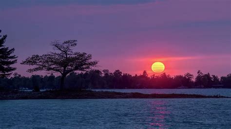 Detroit Point Glowing Sunset Photograph By Ron Wiltse Pixels