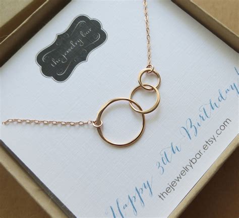 It's a big occasion, so finding a worthy 30th present idea can be a little daunting. 30th birthday gift for her, three circle necklace, 30th birthday gift for women, thirtieth ...